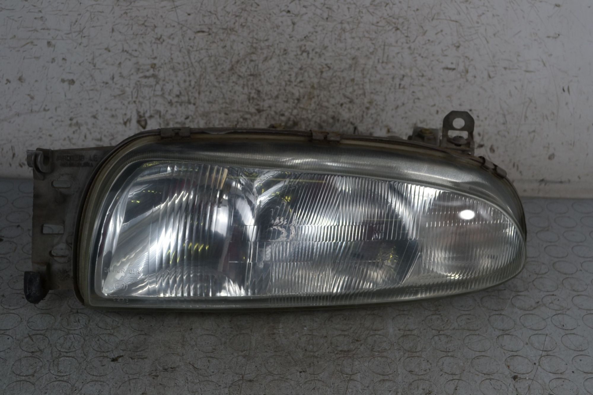 Faro anteriore SX Ford Fiesta IV Dal 1995 al 2002 Cod 1042631  1696411910886