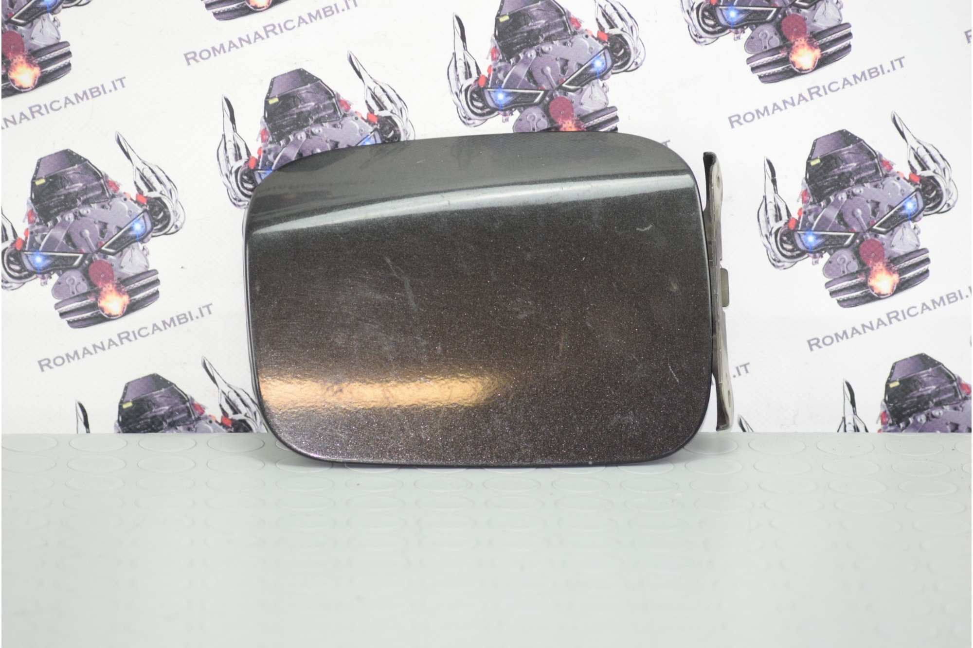 Sportello carburante Nissan Micra anno '03 - '10 colore Nero Cod: 78830AX005  2411111125427