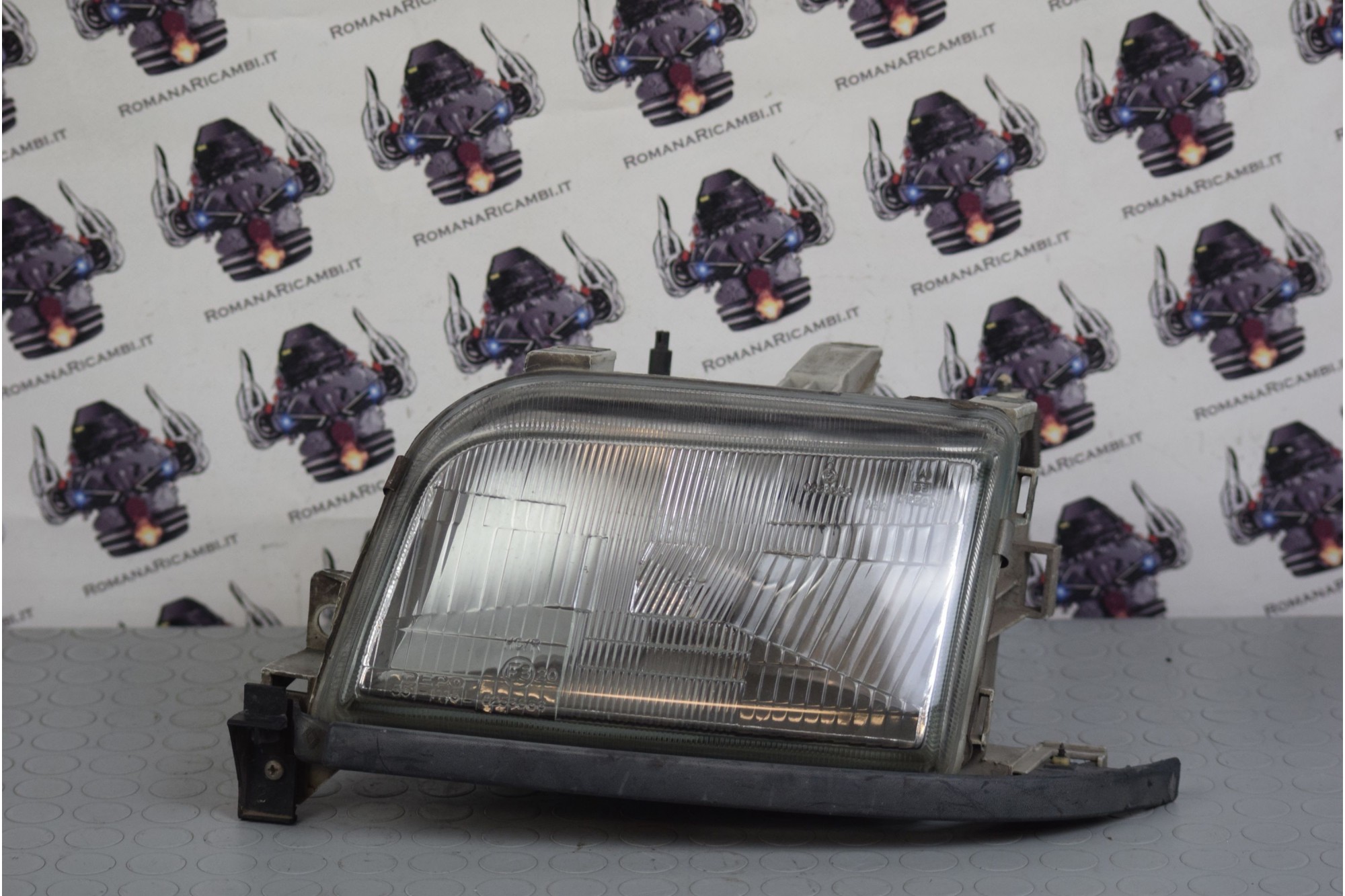Faro anteriore SX Renault Clio dal 1990 al 1998 cod 0253668  2411111138441